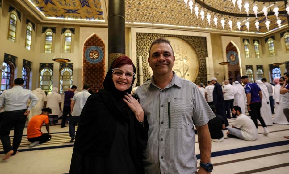 Canadian couple Dorinel and Clara Popa pose for a picture inside Doha’s Blue Mosque, during the Qatar 2022 World Cup football tournament, on November 29, 2022. — AFP
