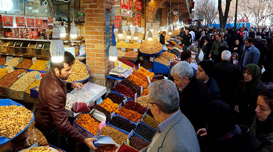 Iranians shop at Tehran's ancient Grand Bazaar on Jan. 4. (Atta Kenare/AFP/Getty Images)