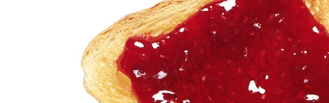 A piece of bread with jam  Description automatically generated with medium confidence