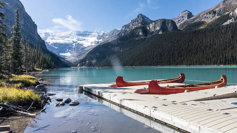 This is where you’re headed: the stunning, turquoise Lake Louise, nestled into the mountains.