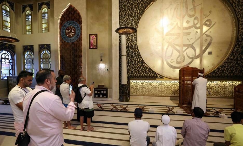 Football fans and local residents visit Doha’s Blue Mosque, during the Qatar 2022 World Cup football tournament, on November 29, 2022. — AFP