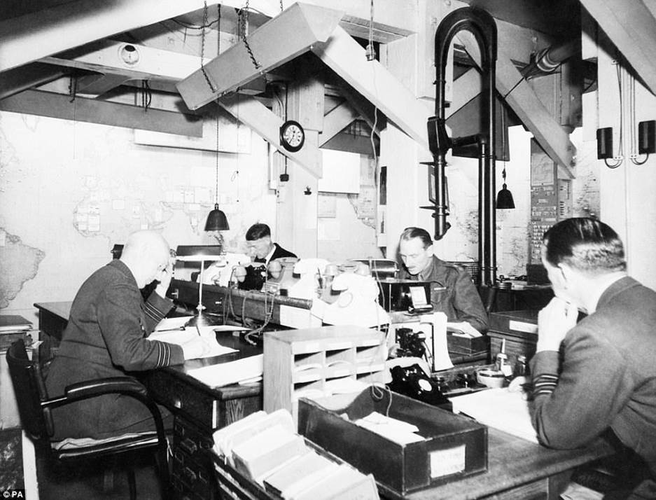 Four Map Room Officers were photographed working in the Cabinet Room in 1945 and the image is one which was revealed to mark the release of the new film, Darkest Hour. The rooms were later abandoned after Japan's surrender in the summer of 1945