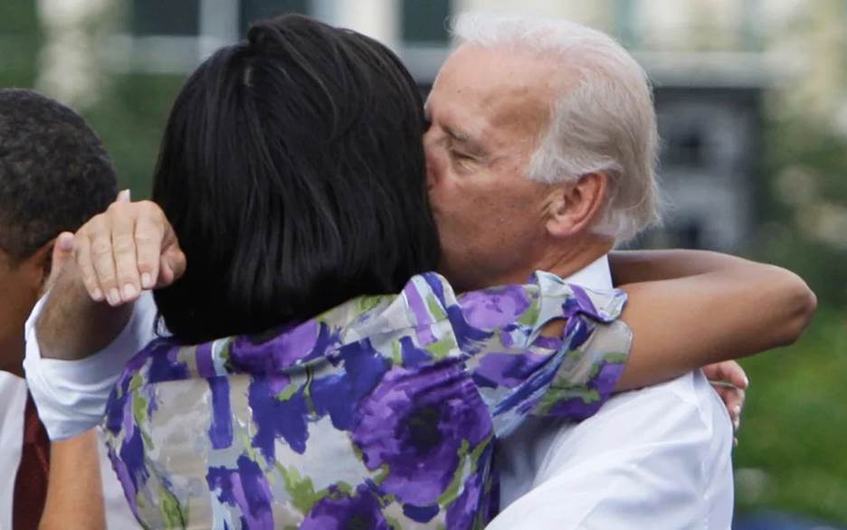 Future President Joe Biden greets potential future President Michelle Obama