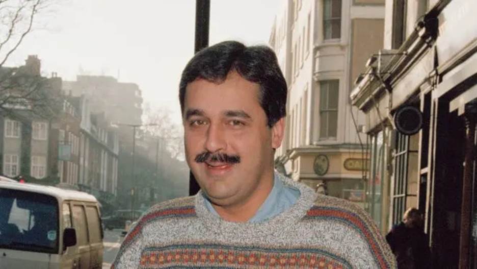 A person with a mustache Description automatically generated