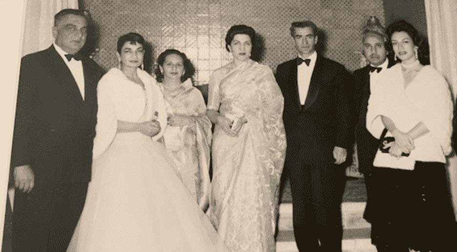 A group of people posing for a photo Description automatically generated