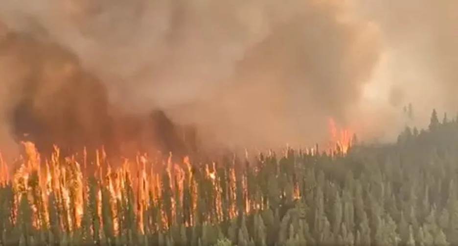 A picture containing fire, wildfire, explosion, pollution Description automatically generated