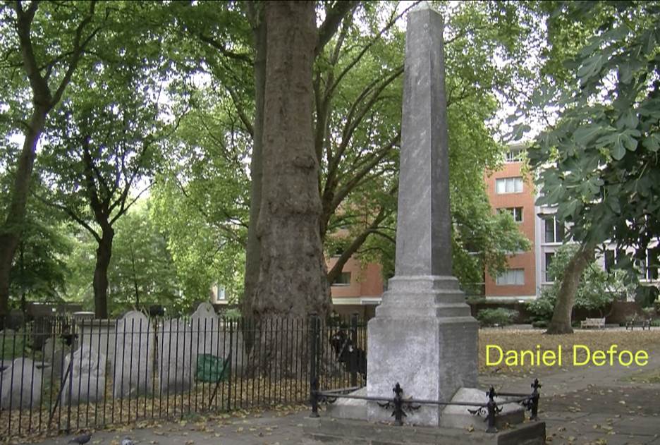 A monument in a cemetery Description automatically generated