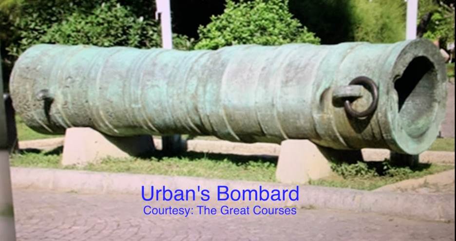 A large metal barrel on a concrete base Description automatically generated with medium confidence