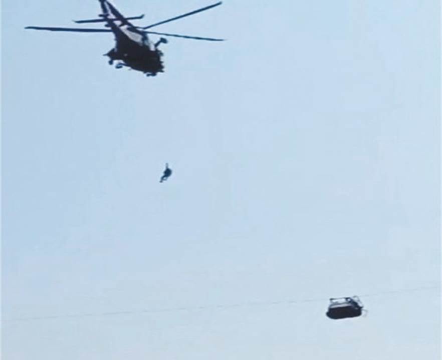 The dramatic rescue mission of students stuck in a chairlift in Khyber Pakhtunkhwa gripped the nation on August 23. The helicopter was able to rescue one student before it had to suspend operations. The remaining passengers were rescued by ziplines | AFP