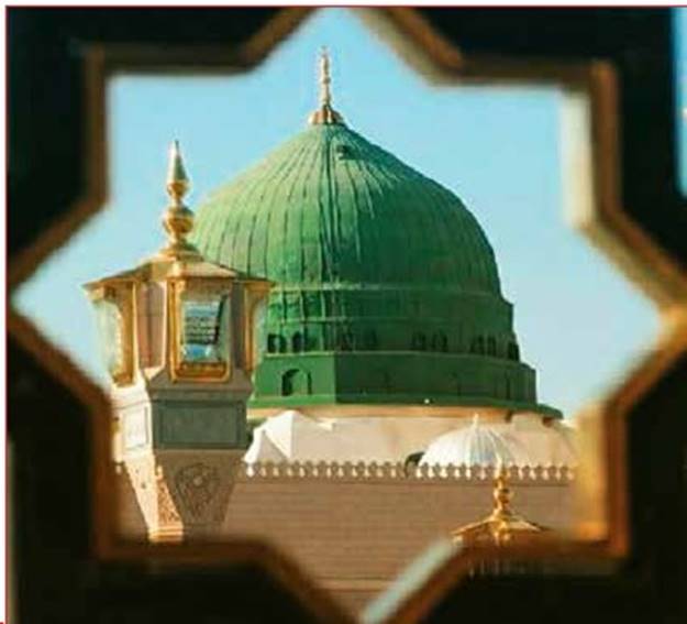 A green dome with gold trim Description automatically generated