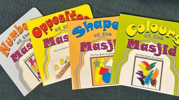 Several books on a table Description automatically generated