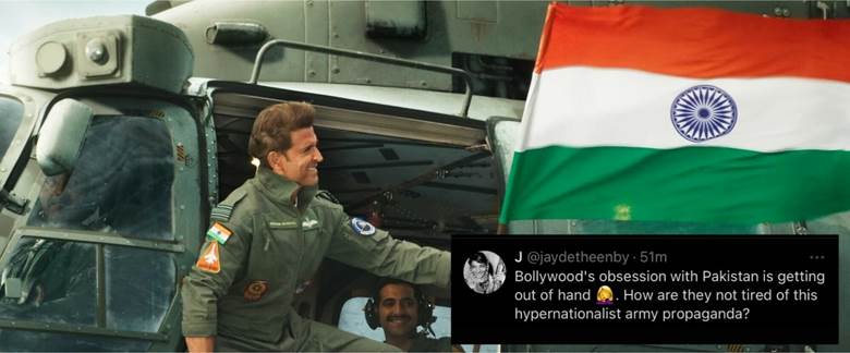 A person in a uniform holding a flag Description automatically generated