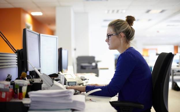 Woman sitting at a desk in an office