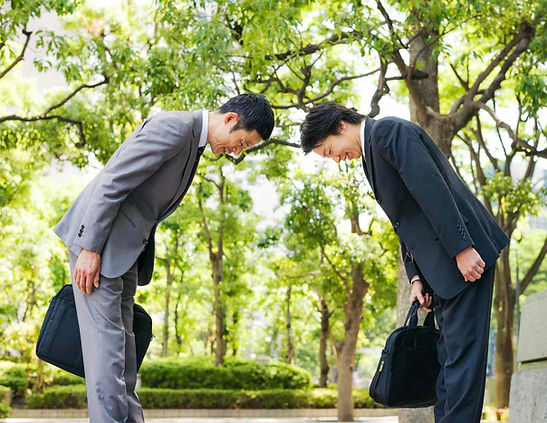 A person looking down at another person's face Description automatically generated
