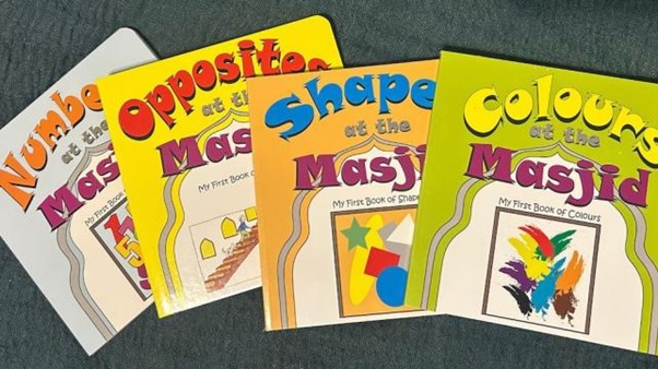 Several books on a table AI-generated content may be incorrect.