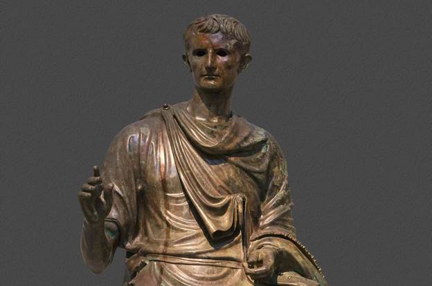 A statue of a person AI-generated content may be incorrect.