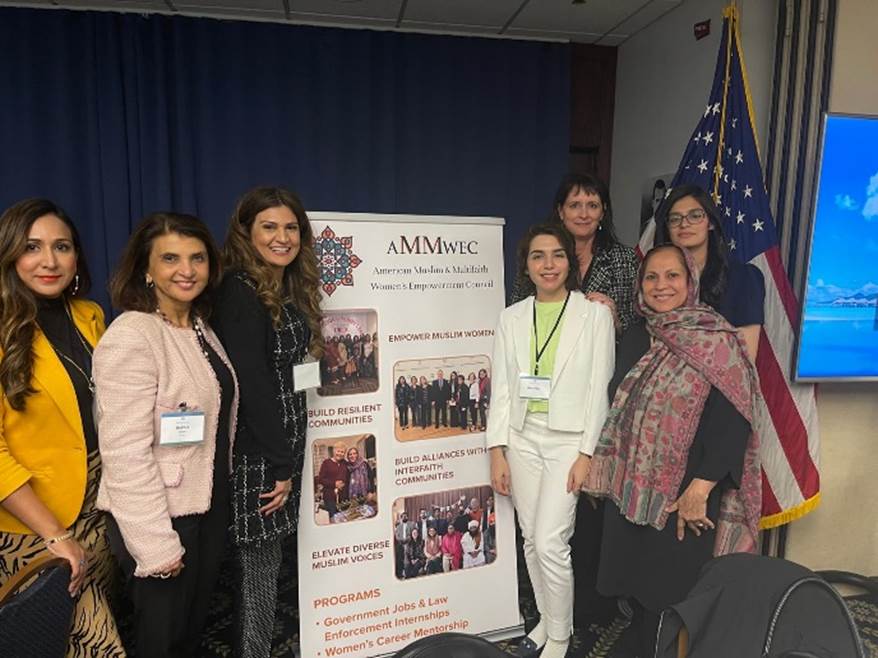 A group of women posing for a photo  Description automatically generated with medium confidence