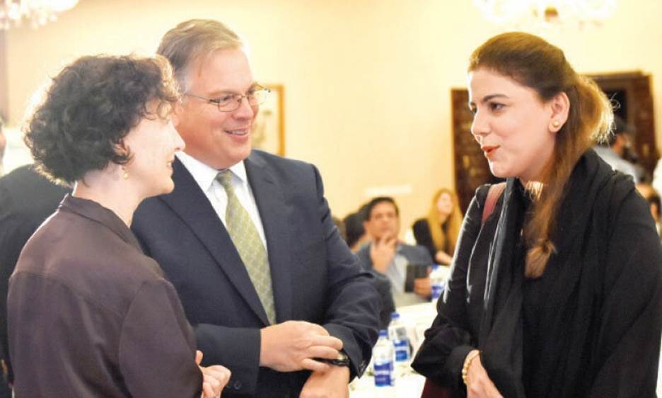 US Ambassador Donald Blome, Parliamentary Secretary for Climate Change Naz Baloch and acting Principal Deputy Assistant Secretary for South and Central Asian Affairs Elizabeth Horst engrossed in conversation at an event in Islamabad on Tuesday. — Photo by Tanveer Shahzad
