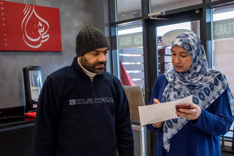 Thanksgiving meals are prepared and packaged at Douglass Pizzeria in Franklin Park through a program with Cornerstone Counseling Marriage & Family Intervention, a Princeton-based nonprofit, to support refugee families in need. Volunteer Tarek Sharif and Cornerstone Founder and CEO Dr. Suzy Ismail go over the the delivery route Tuesday November 23, 2021.