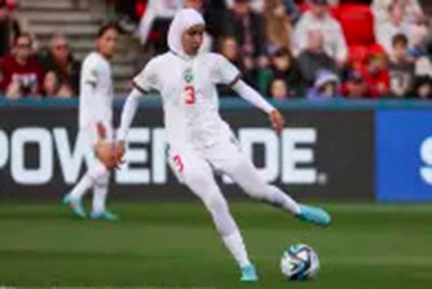 Morocco's Nouhaila Benzina kicks the ball during the Women's World Cup Group H soccer match between South Korea and Morocco in Adelaide, Australia, Sunday, July 30, 2023. (AP Photo/James Elsby)