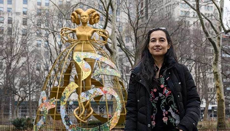 Artist Shahzia Sikander stands in front of her sculpture Witness stands in Madison Square Park as part of her multimedia exhibition Havah...to breathe, air, life on February 7, 2023, in New York City. — AFP