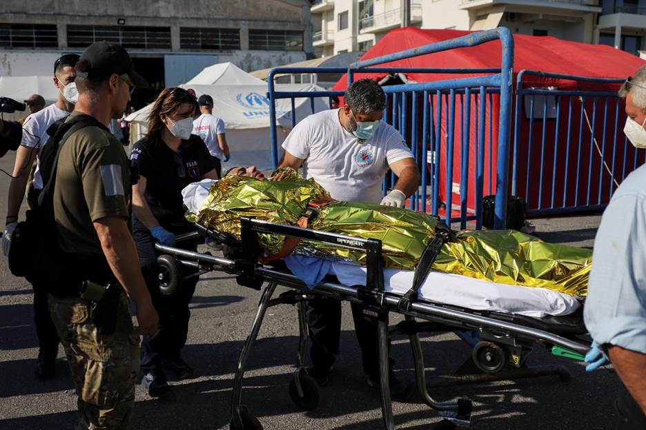 rescuers transfer a migrant to an ambulance following a rescue operation after their boat capsized at open sea in kalamata greece june 14 2023 photo reuters