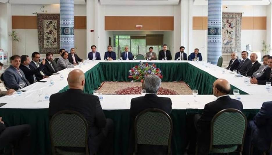 Federal Minister for Law and Justice Azam Nazeer Tarar ⁦(centre) during an interaction with members of the Pakistani community in the US at Embassy of Pakistan in Washington DC. — Twitter/@PakinUSA
