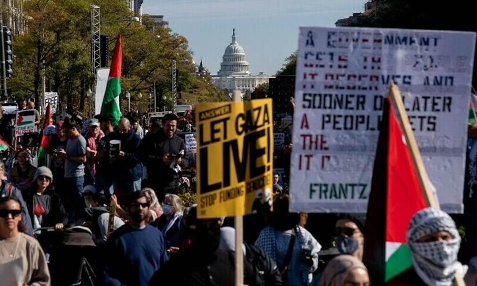 The US Capitol building is seen in the distance as demonstrators gather in Freedom Plaza during a rally in support of Palestinians in Washington, DC, on November 4, 2023. — AFP