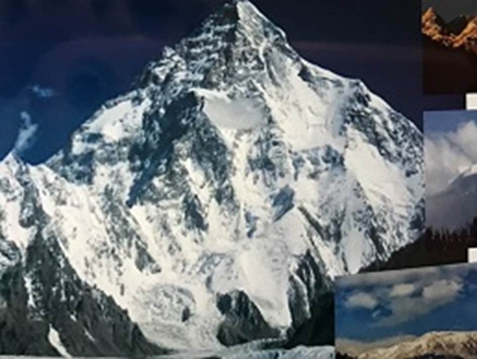 A mountain with snow and ice  Description automatically generated