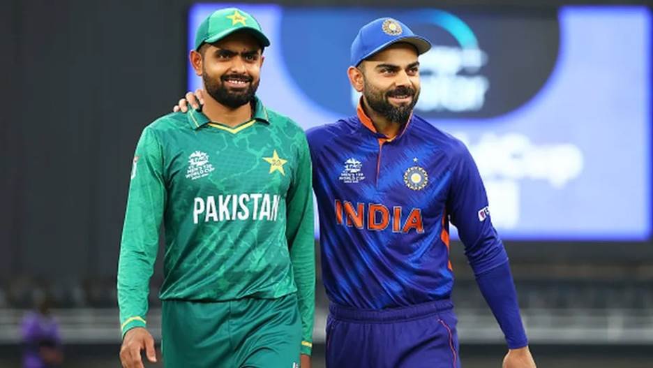 Babar Azam of Pakistan and Virat Kohli of India interact ahead of the ICC Men's T20 World Cup match between India and Pakistan at Dubai International Stadium on October 24, 2021 in Dubai, United Arab Emirates