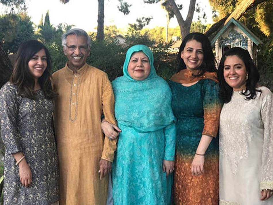 A group of people posing for a photo Description automatically generated