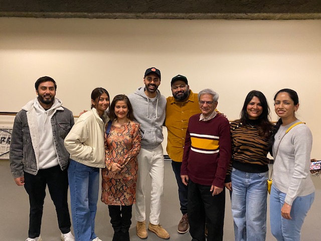 A group of people posing for a photo Description automatically generated