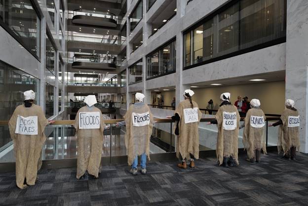 Several people wearing white caps and white hats Description automatically generated with medium confidence
