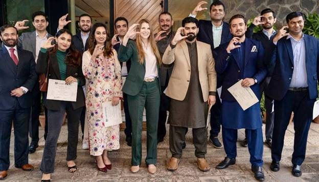 British High Commissioner to Pakistan, Jane Marriott, poses with Pakistani students at UK High Commission in Islamabad. &mdash; X/@JaneMarriottUK