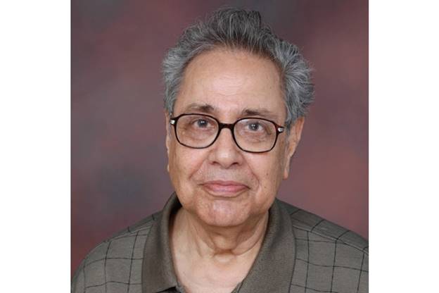 A close-up of a person wearing glasses AI-generated content may be incorrect.
