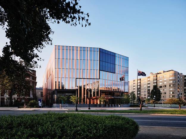 A building with glass walls and a glass wall  AI-generated content may be incorrect.