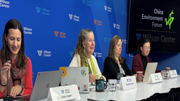 A group of women sitting at a table AI-generated content may be incorrect.