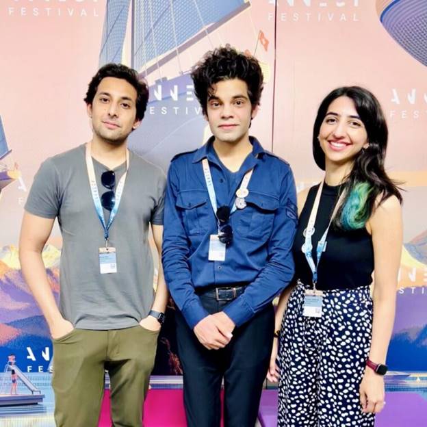 A group of people posing for a photo Description automatically generated