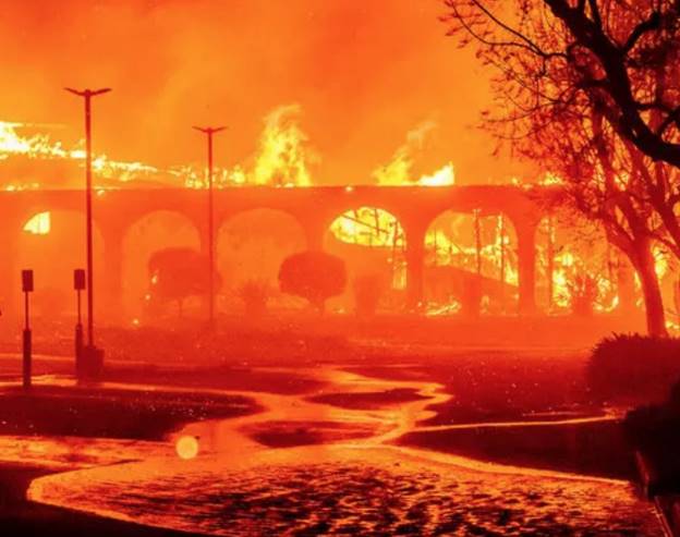 A fire on a bridge  Description automatically generated
