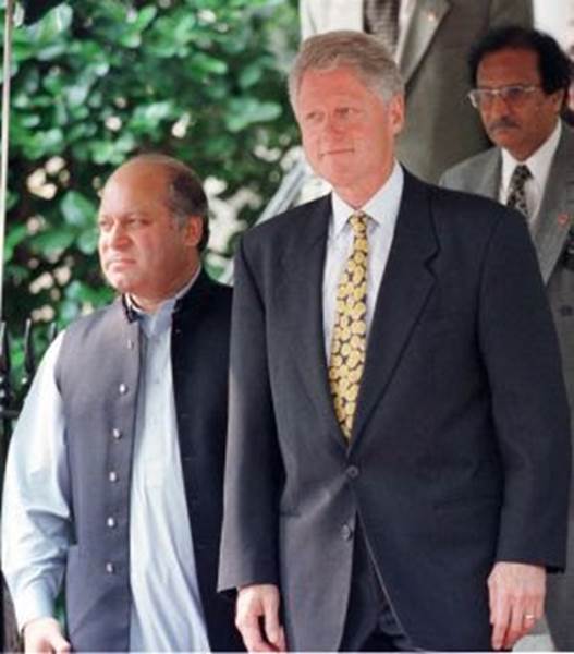 A group of men in suits Description automatically generated with medium confidence