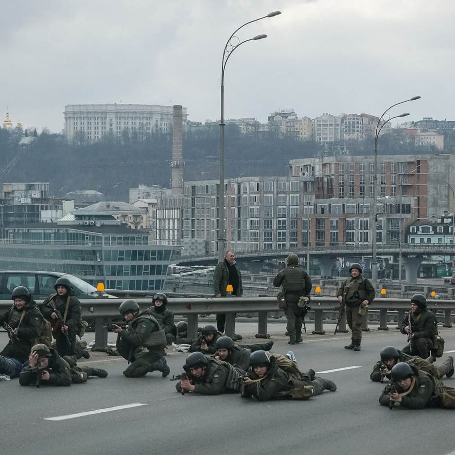 A group of people in uniform Description automatically generated with low confidence