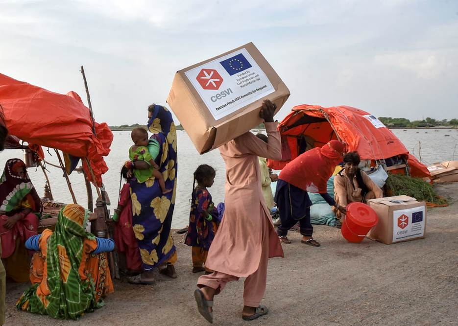 Aid worker provides support after floods in Pakistan