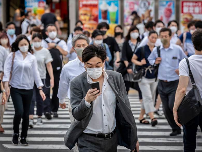 Japan shrugs at name-and-shame policy amid Covid fatigue and changing norms  | Japan | The Guardian