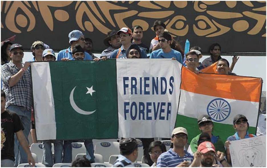 A group of people holding flags Description automatically generated