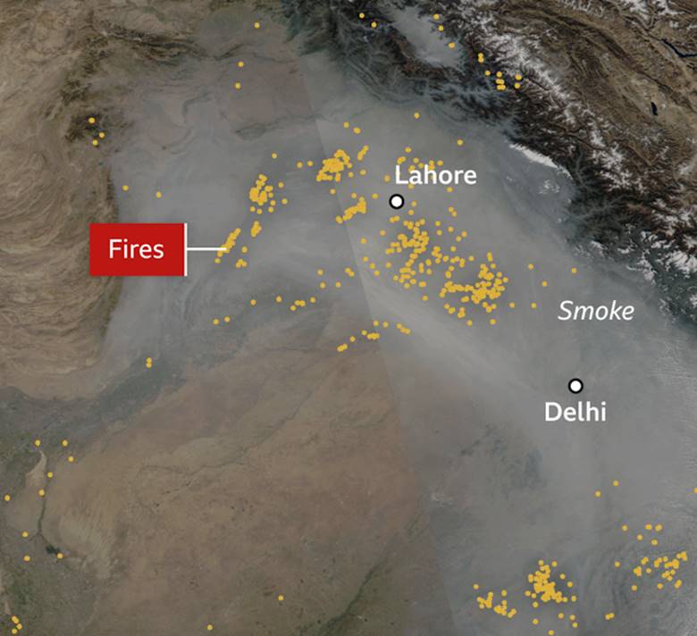 A satellite view of smoke and fire Description automatically generated