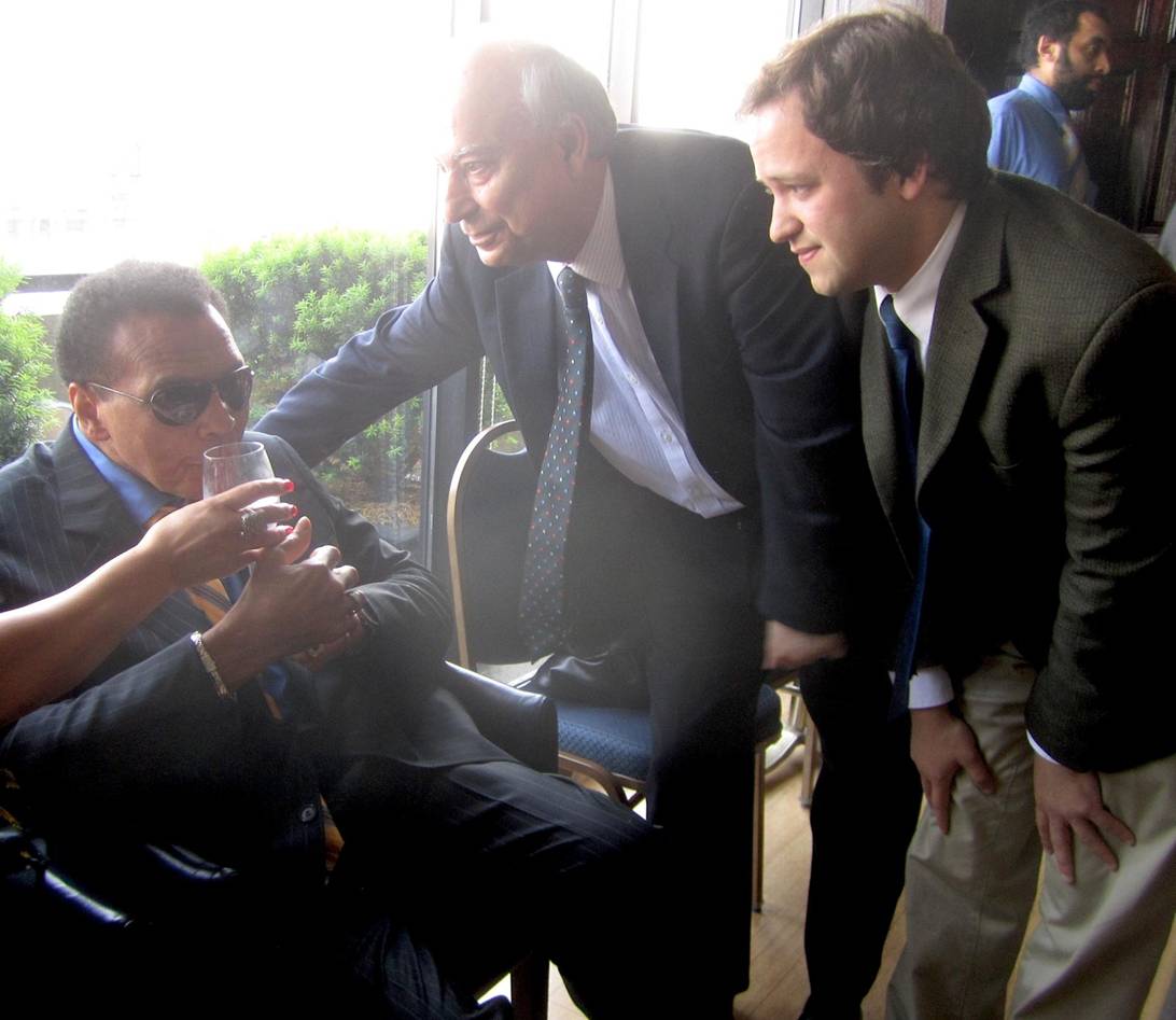 A group of men in suits  AI-generated content may be incorrect.