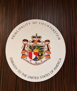 A white plate with a coat of arms and a crown on it  AI-generated content may be incorrect.