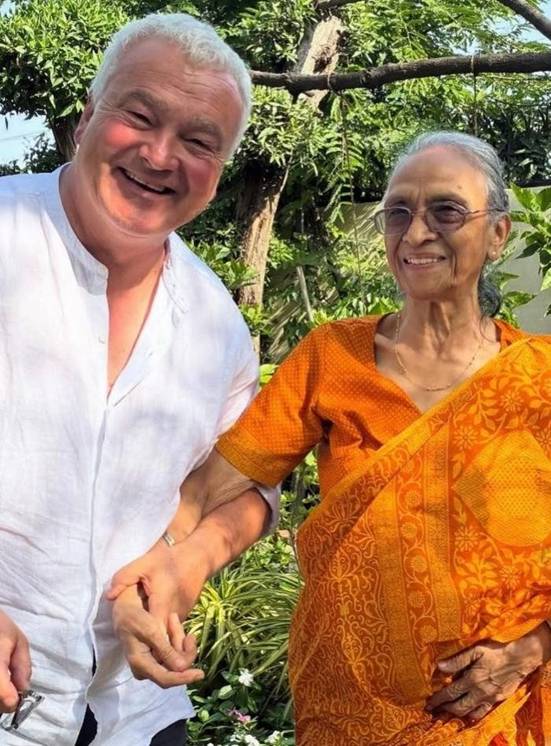 A person and person holding hands  AI-generated content may be incorrect.